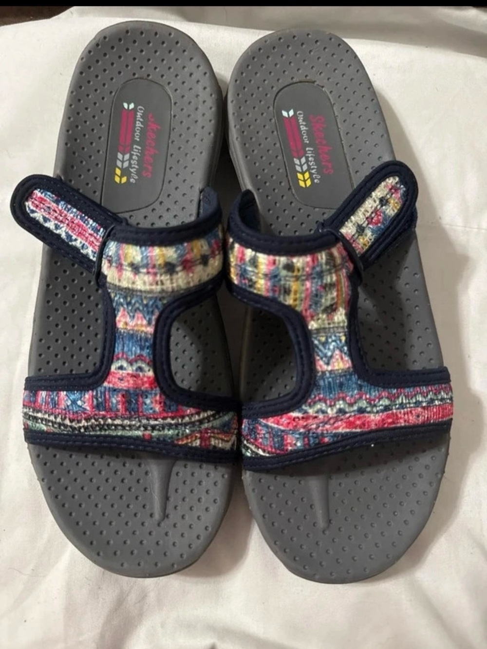Skechers women’s Gray Slide Sandals with Multicolor Patterned Straps